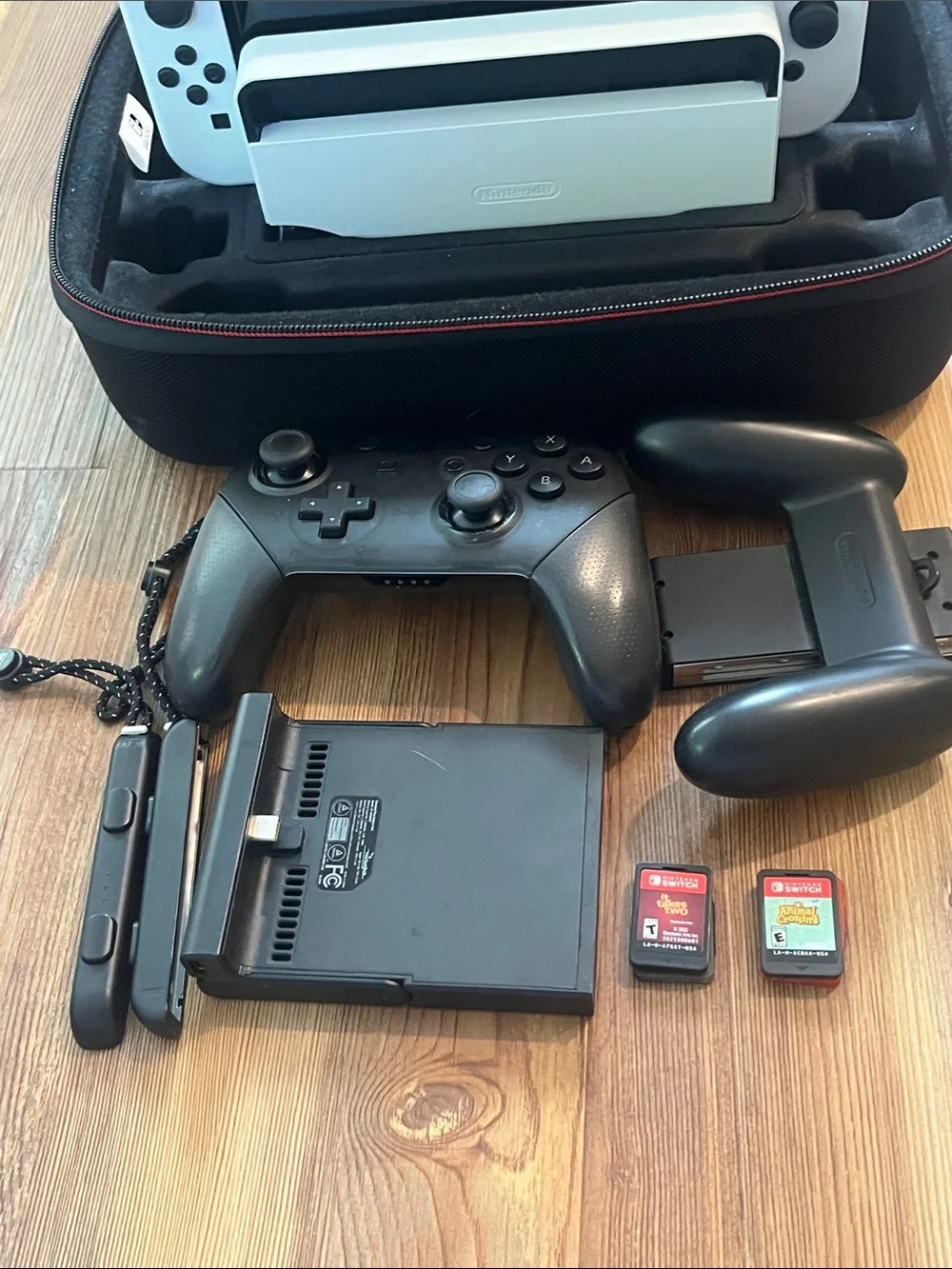 Nintendo Switch OLED Console with White Joy-Con Controllers Bundle